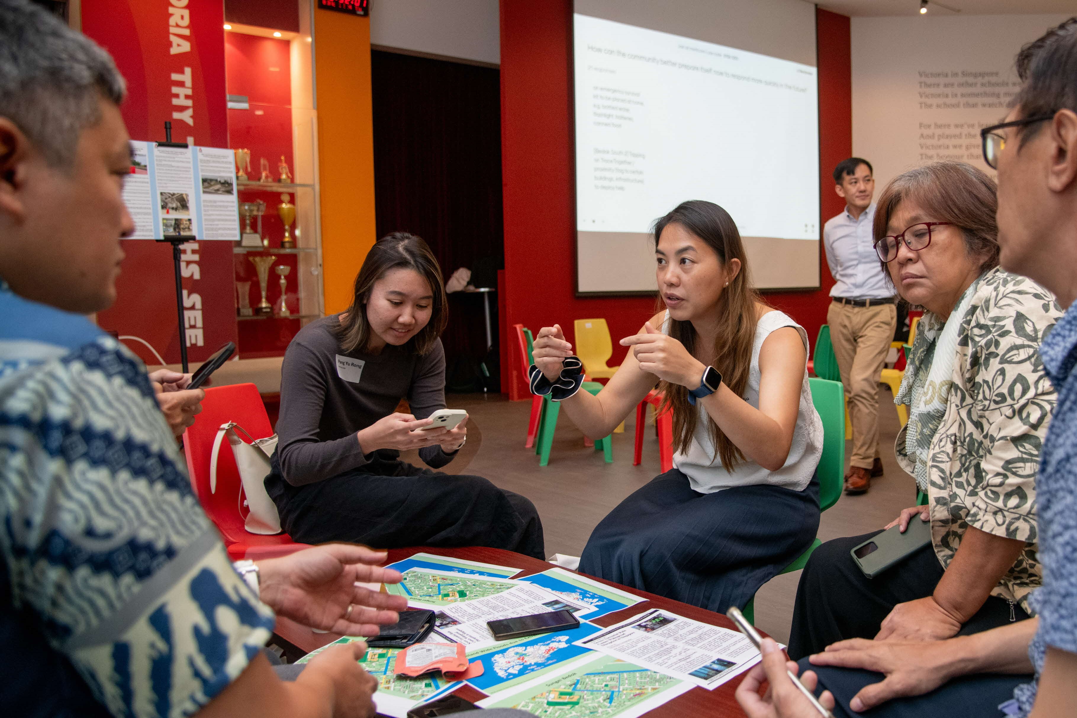 Participants discussing about flood preparedness at our inaugural table-top exercise on climate threats